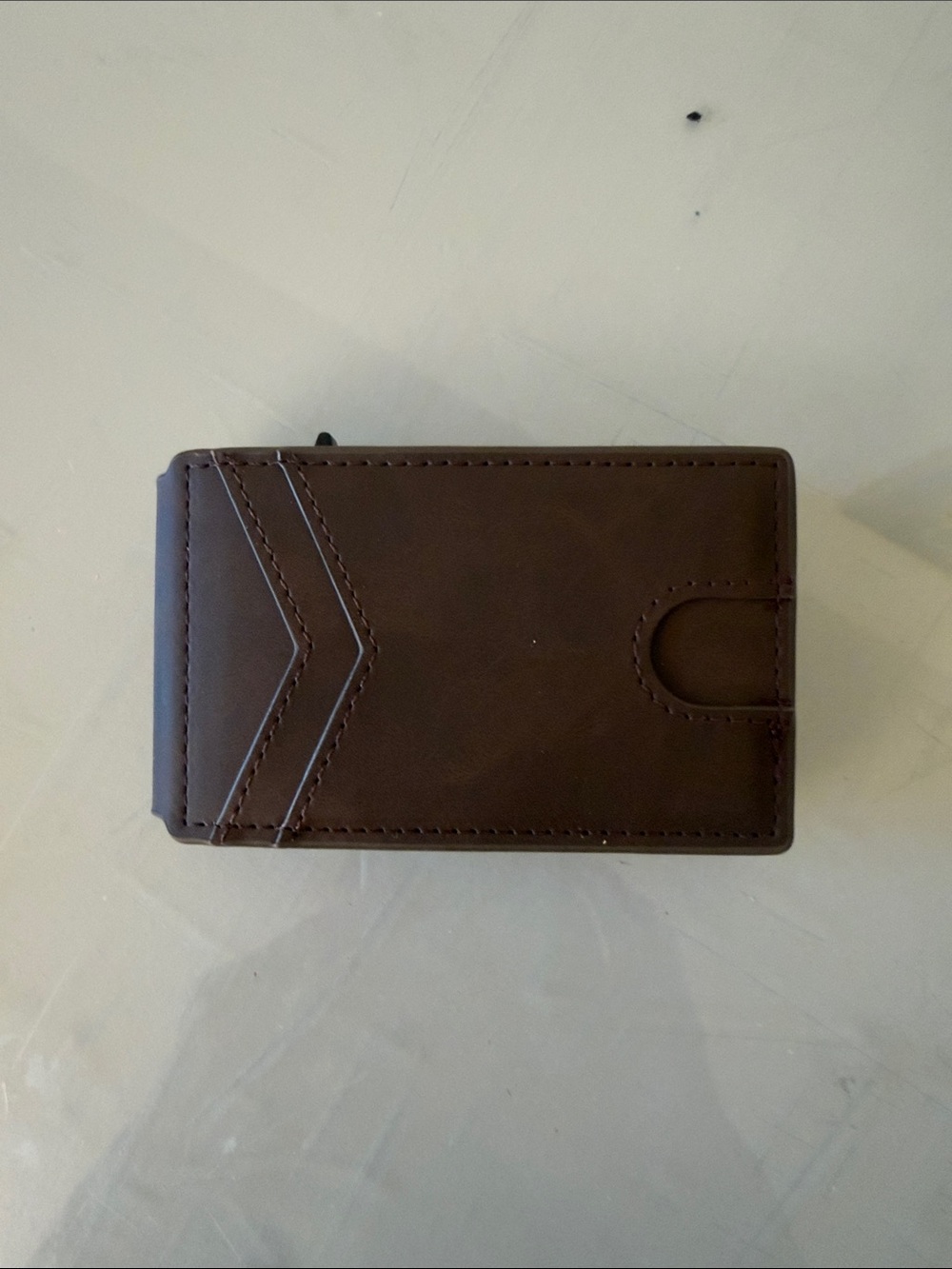 Brown Leather Bifold Wallet with pop up aluminum case.
